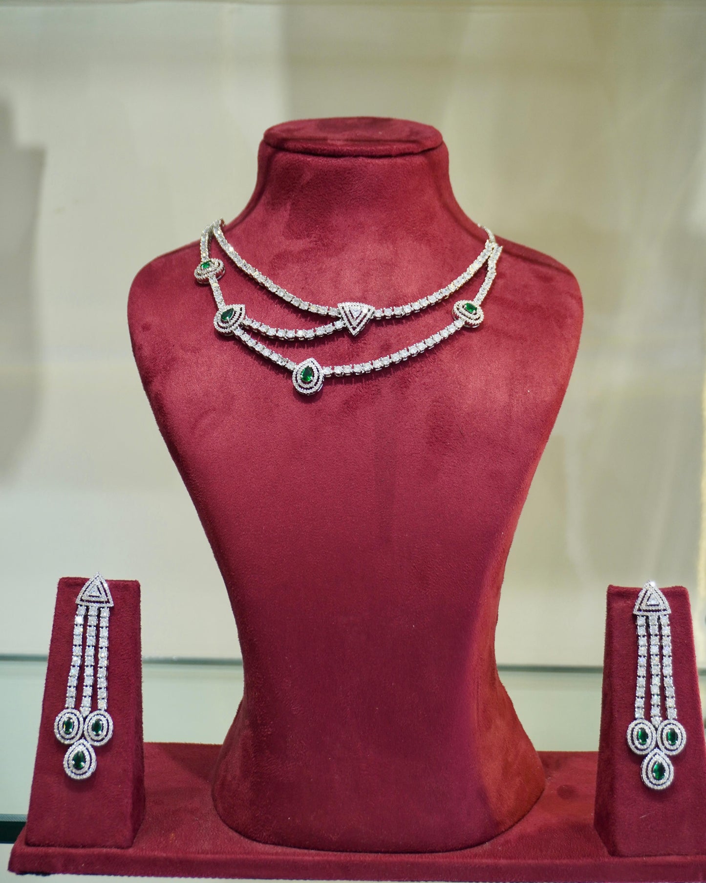 ananyas green american diamond necklace and earrings