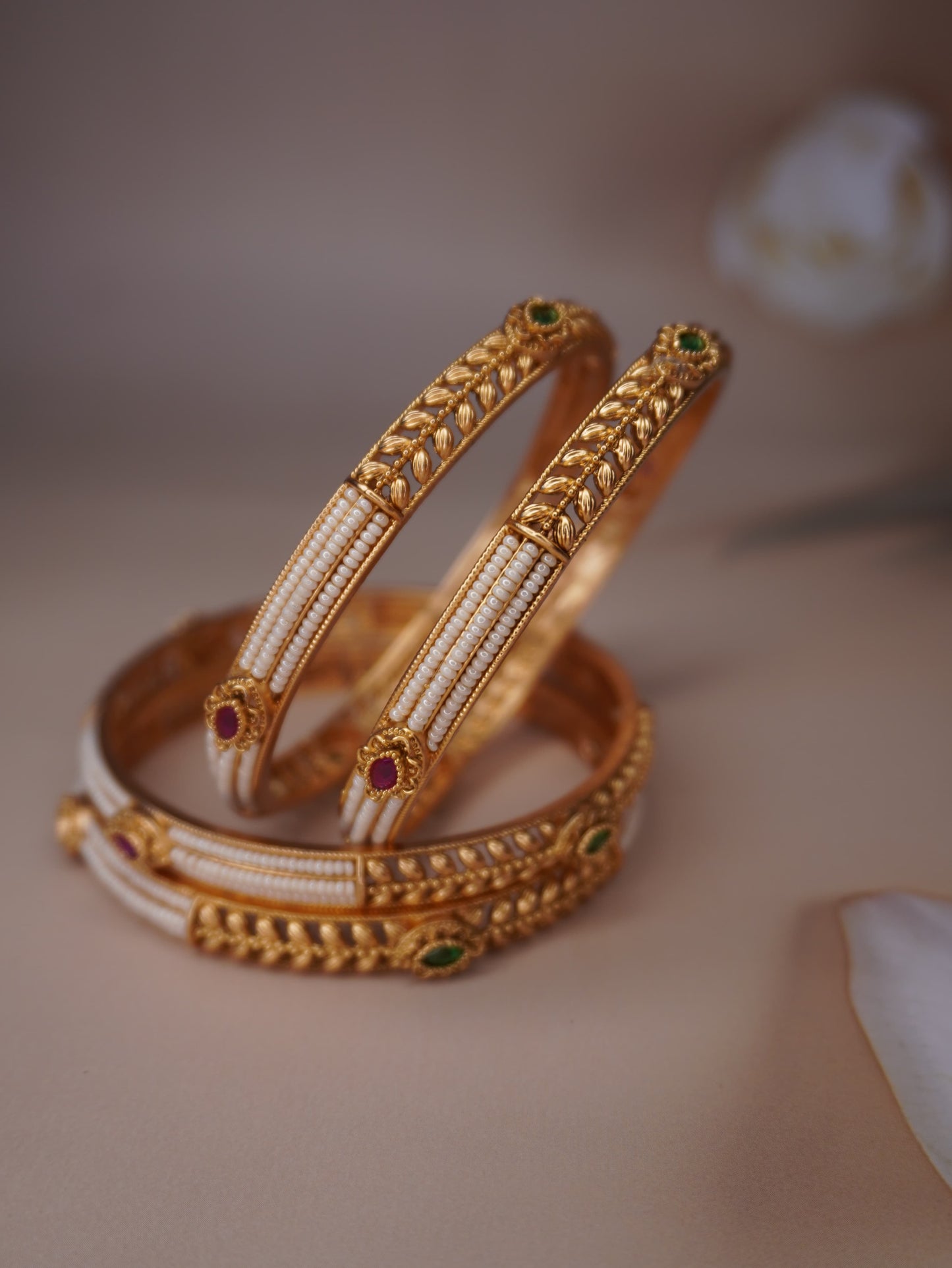 Elegant Pearl and Stone Bangles